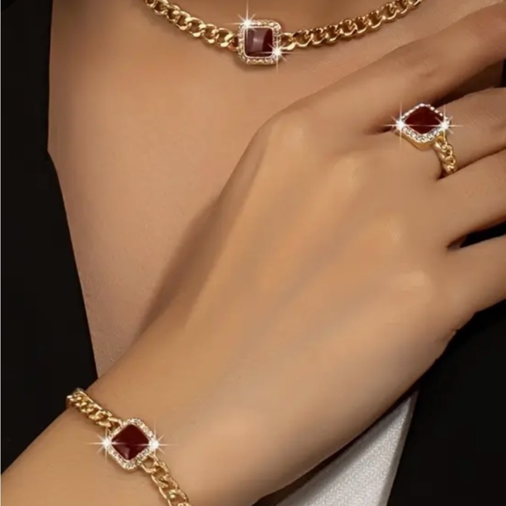 Elegant Jewelry 3pc Set .14kt Gold plated,red square surrounded by Rhinestones.